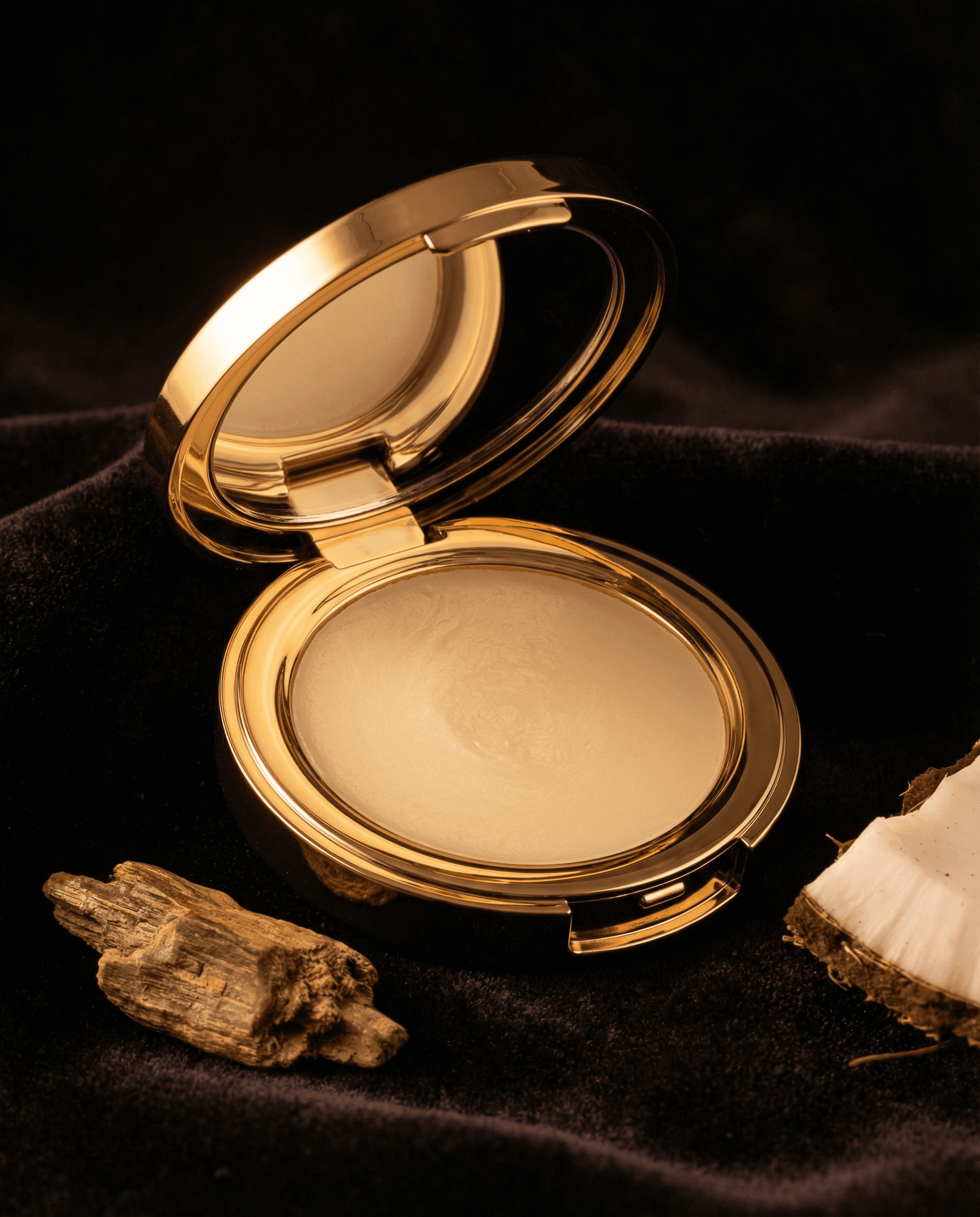 Mubadira Royal Balm in engraved gold compact